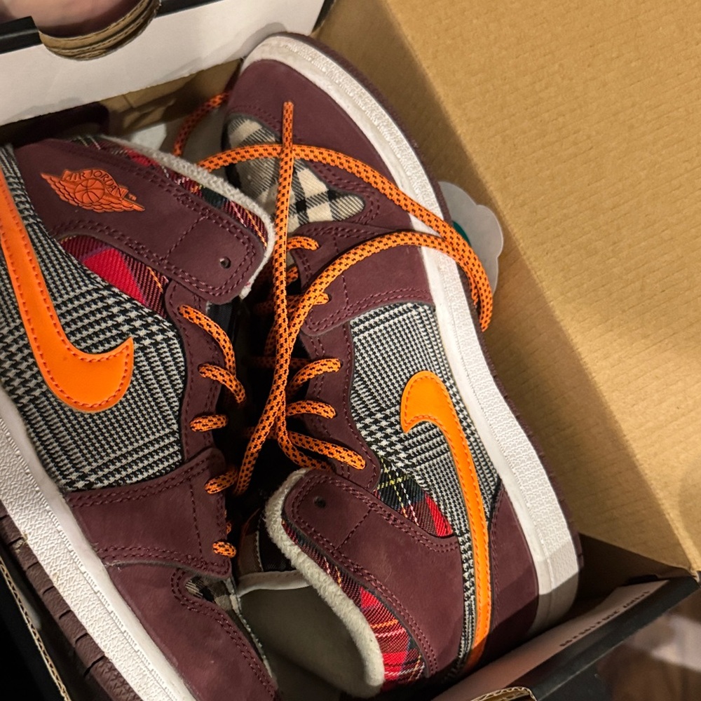 Colorful High-Top Sneakers with Orange Accents